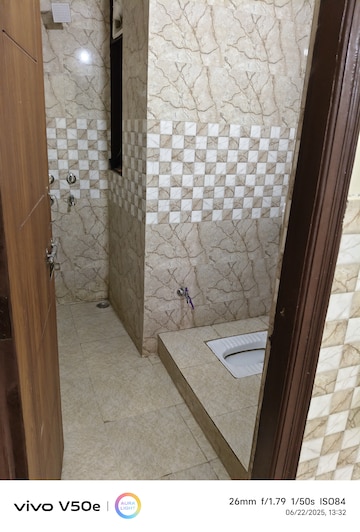 Bathroom in 3 BHK Apartment at Vishwakarma Colony – for Sale