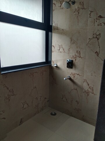 Bathroom in 3 BHK Builder Floor at Ambience Multi Unit Residential Apartments, Jasola – for Rent