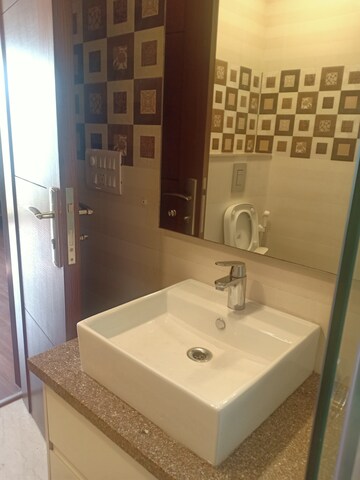 Bathroom in 3 BHK Apartment at Sarvapriya Vihar – for Rent