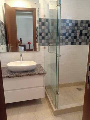 Bathroom in 3 BHK Apartment at Sarvapriya Vihar – for Rent