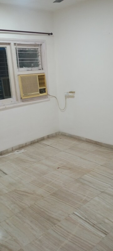 Room in 2 BHK Apartment at Brindaban CHS, Poonam Nagar – for Rent