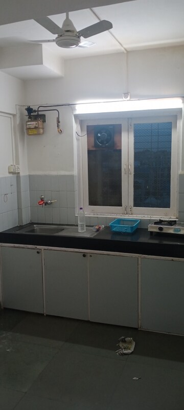 Kitchen in 2 BHK Apartment at Brindaban CHS, Poonam Nagar – for Rent