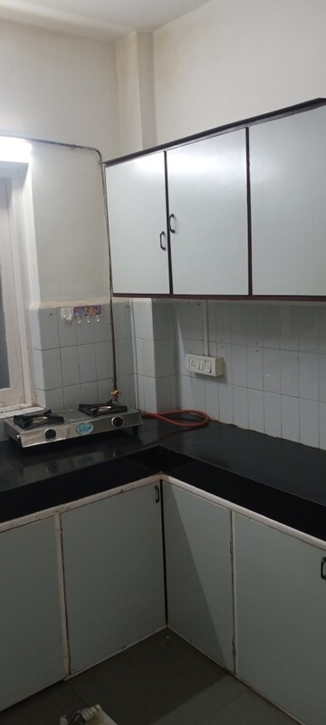 Kitchen in 2 BHK Apartment at Brindaban CHS, Poonam Nagar – for Rent