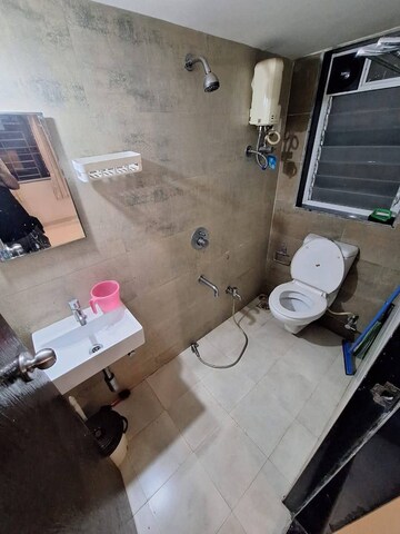 Bathroom in 2 BHK Apartment at Surbhi CHS Andheri West, Andheri West – for Rent