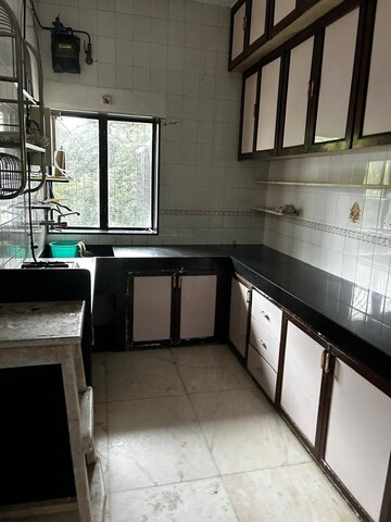 Kitchen in 2 BHK Apartment at Megha Villa, Vile Parle West – for Rent