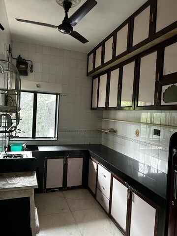 Kitchen in 2 BHK Apartment at Megha Villa, Vile Parle West – for Rent