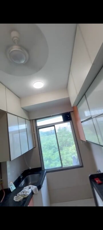 Kitchen in 2.5 BHK Apartment at Tattva Mittal Cove, Andheri West – for Rent