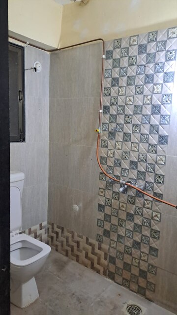 Master Bedroom in 2 BHK Apartment at Raunak Paradise, Kokanipada – for Rent