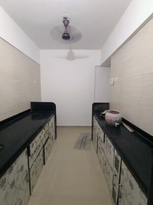 Kitchen in 1 BHK Apartment at Dombivli West – for Sale