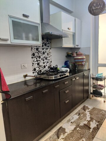 Kitchen in 2 BHK Apartment at Aditya Urban Casa, Sector 78 – for Rent