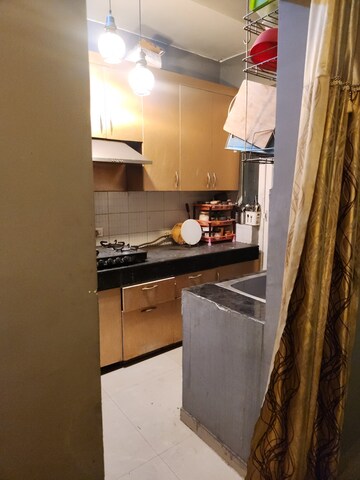 Kitchen in 2.5 BHK Apartment at Prateek Wisteria, Sector 77 – for Rent