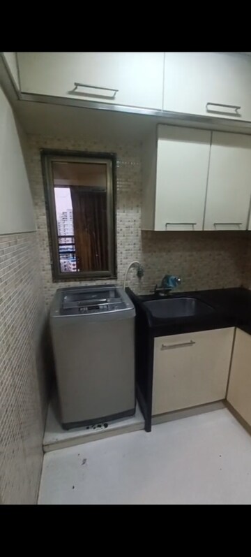 Kitchen in 1 BHK Apartment at Landmark Tower, Dadar East – for Rent