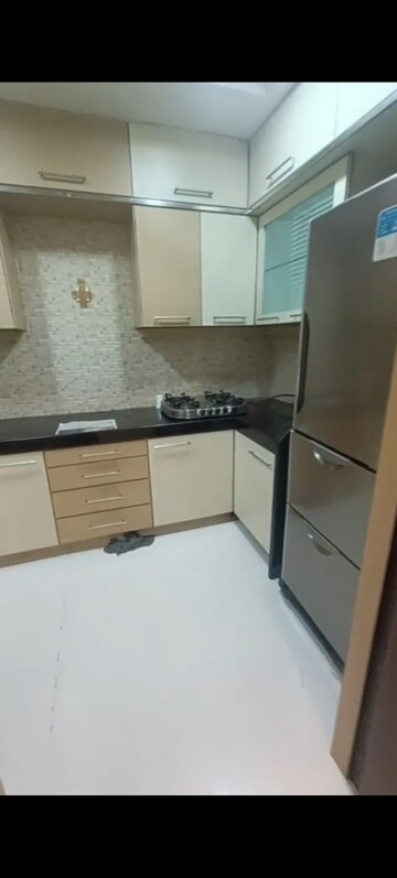 Kitchen in 1 BHK Apartment at Landmark Tower, Dadar East – for Rent