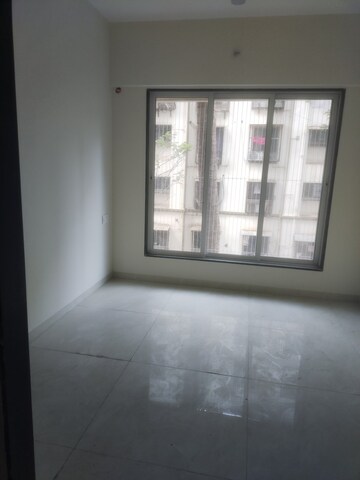 Bedroom in 1 BHK Apartment at Hirani Om Sukhkarta Heights, Vikhroli East – for Rent