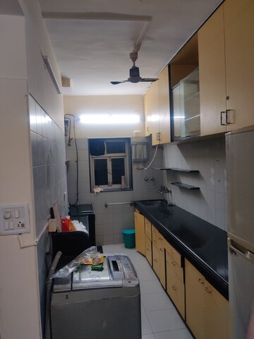 Kitchen in 2 BHK Apartment at Arvasu Chs Ltd, Santacruz West – for Rent
