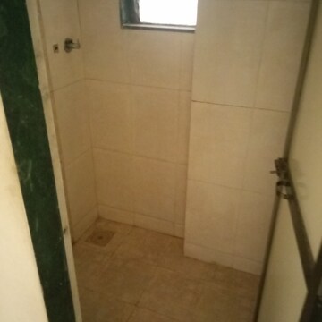 Bathroom in 1 BHK Apartment at Aastha Heights, Goregaon West – for Rent