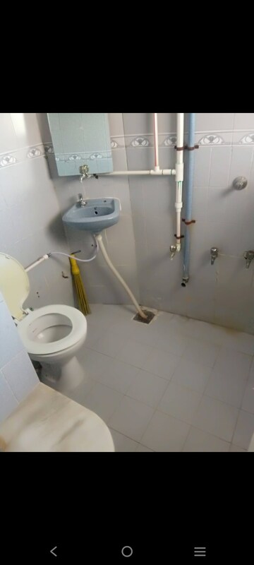Bathroom in 2 BHK Apartment at Simandhar Parth Indraprasth Tower, Vastrapur – for Rent