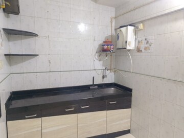 Kitchen in 1 BHK Apartment at Brightland Phase 1 CHS, Balkum Pada – for Rent