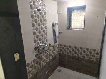 Bathroom in 1 BHK Apartment at Brightland Phase 1 CHS, Balkum Pada – for Rent