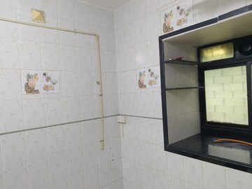 Kitchen in 1 BHK Apartment at Brightland Phase 1 CHS, Balkum Pada – for Rent