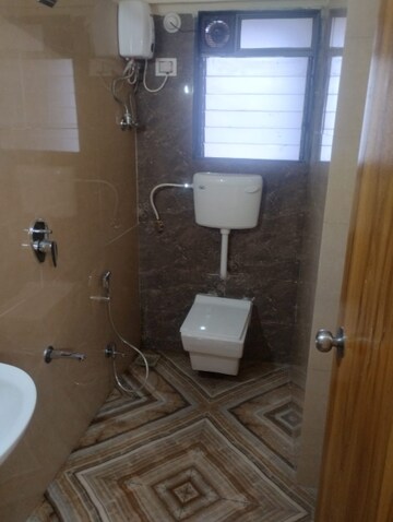 Bathroom in 1 BHK Apartment at Kolte Patil Vaayu, Dahisar West – for Rent