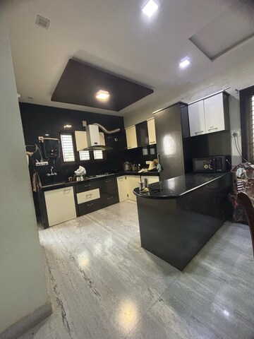 Kitchen in 4 BHK Apartment at Magunta Layout – for Sale