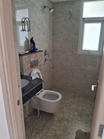 Bathroom in 2 BHK Apartment at Wave Executive Floors, Wave City – for Rent