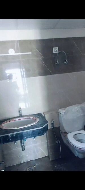 Bathroom in 1 BHK Apartment at Cosmos Express 99, Sector 99 – for Sale