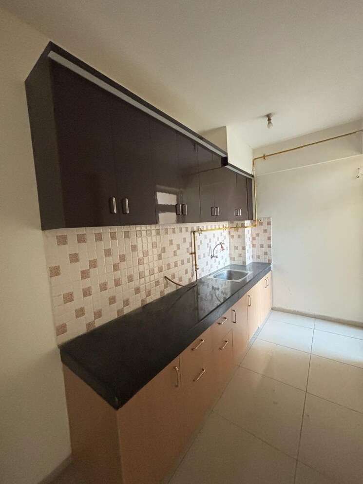 Kitchen, wave-dream-homes 2 Bedroom 808 Sq.Ft. Apartment In Wave City Ghaziabad 8852936