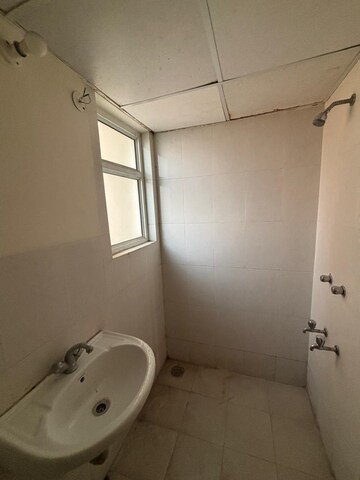 Bathroom in 2 BHK Apartment at Wave Dream Homes, Wave City – for Rent