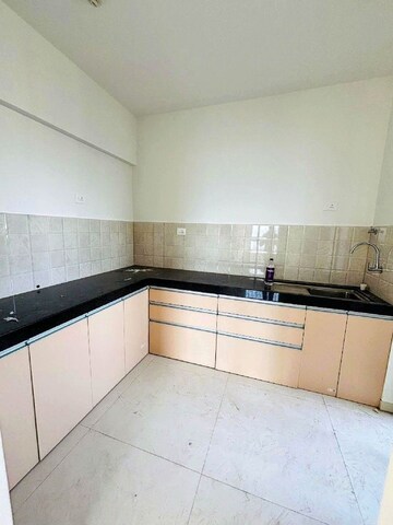 Kitchen in 2 BHK Apartment at Shapoorji Pallonji Sensorium, Hinjewadi – for Rent