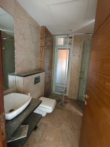 Bathroom in 4 BHK Apartment at Antriksh Golf View, Sector 78 – for Rent
