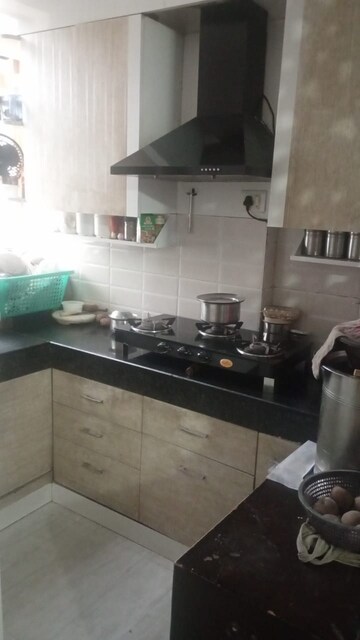 Kitchen in 3 BHK Apartment at Puri Diplomatic Greens Villas, Sector 111 – for Sale