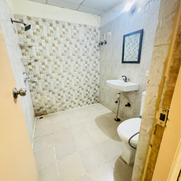Bathroom in 3 BHK Apartment at Antriksh Golf View, Sector 78 – for Rent