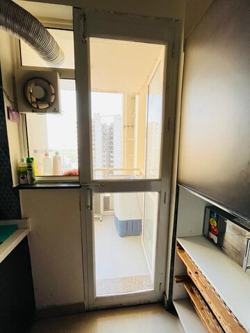 Kitchen in 3.5 BHK Apartment at Puri Diplomatic Greens Villas, Sector 111 – for Sale