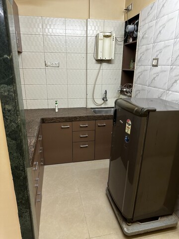 Kitchen in 2 BHK Apartment at Yashraj Park CHS, Kasarvadavali – for Sale