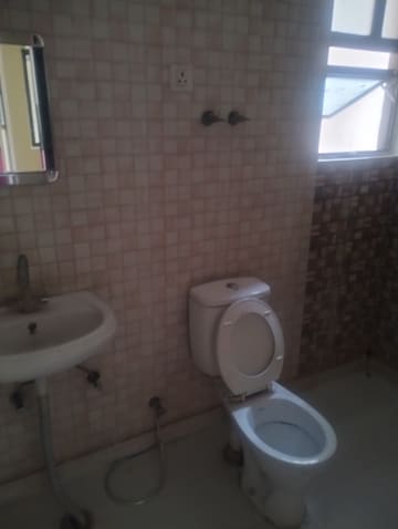 Bathroom in 2.5 BHK Apartment at SG Grand, Raj Nagar Extension – for Rent