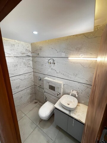 Bathroom in 3 BHK Builder Floor at Shahastradhara Road – for Sale