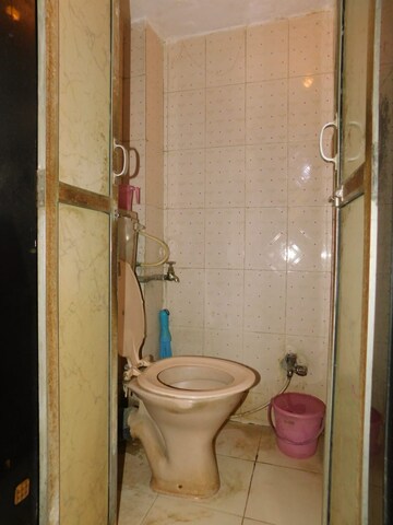 Bathroom in 1 BHK Apartment at Railwaymens Apna Ghar CHS, Jogeshwari East – for Sale