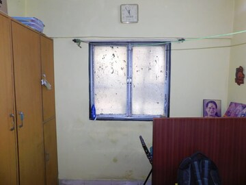 Bedroom in 1 BHK Apartment at Railwaymens Apna Ghar CHS, Jogeshwari East – for Sale