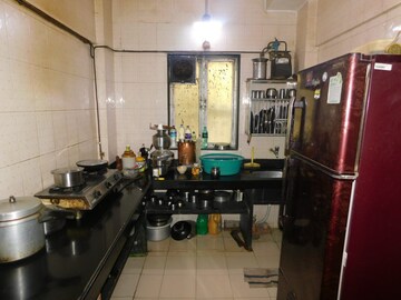 Kitchen in 1 BHK Apartment at Railwaymens Apna Ghar CHS, Jogeshwari East – for Sale