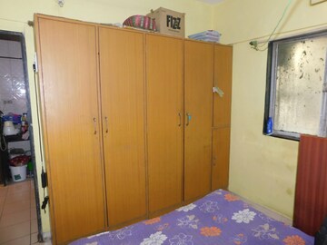 Bedroom in 1 BHK Apartment at Railwaymens Apna Ghar CHS, Jogeshwari East – for Sale