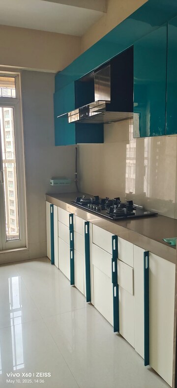 Kitchen in 2 BHK Apartment at Dosti Group Imperia, Manpada – for Rent