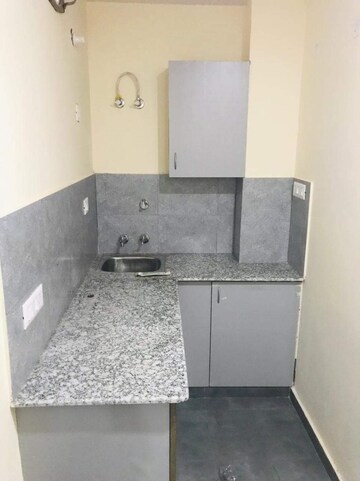 Kitchen in 1 RK Builder Floor at Ansal Sushant Lok I, Sector 43 – for Rent