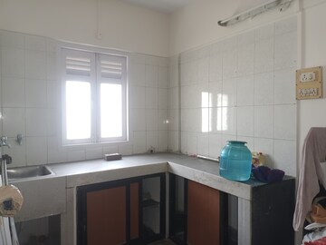 Kitchen in 1 BHK Apartment at Railwaymens Apna Ghar CHS, Jogeshwari East – for Sale