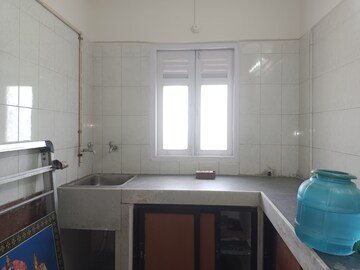 Kitchen in 1 BHK Apartment at Railwaymens Apna Ghar CHS, Jogeshwari East – for Sale