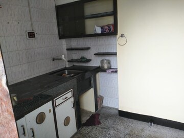 Kitchen in 1 BHK Apartment at Bhusari Colony – for Sale