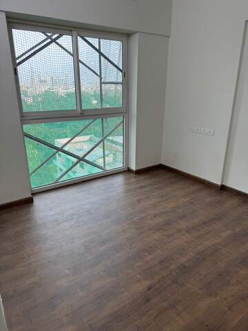 Bedroom in 2 BHK Apartment at Shapoorji Pallonji Siennaa, Kandivali East – for Rent