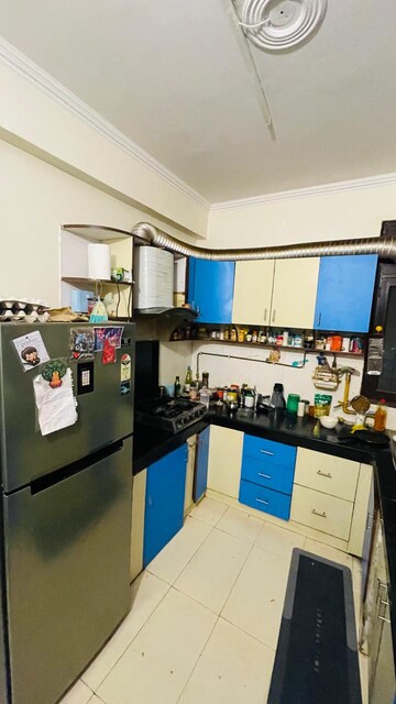 Kitchen in 3 BHK Apartment at Tarika CGHS, Sector 43 – for Sale