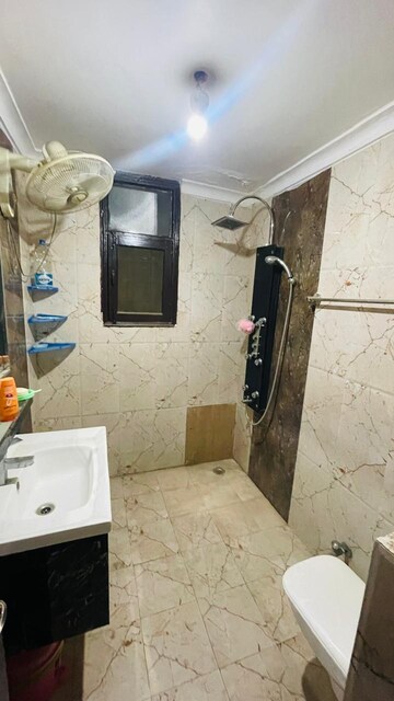 Kitchen in 3 BHK Apartment at Tarika CGHS, Sector 43 – for Sale